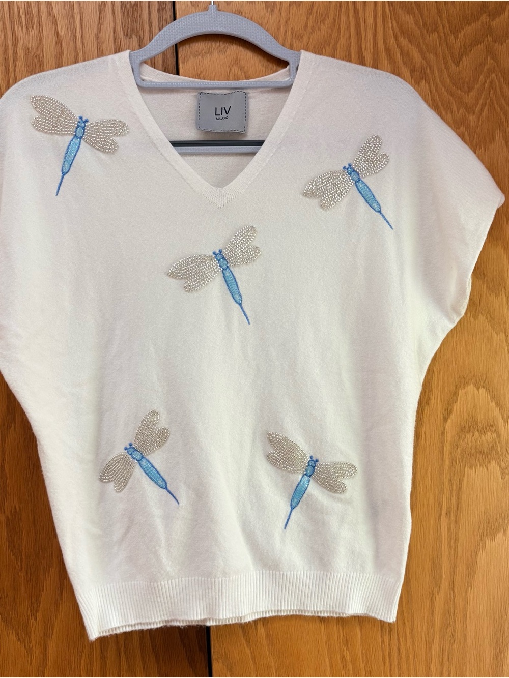 LIV White V-Neck Sweater with Blue Dragonfly Embellishments